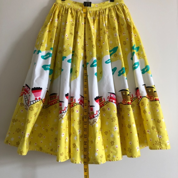 Pinup Couture Jenny Skirt in Mary Blair "Bon Voyage" Yellow Train Print, Small - Picture 10 of 10